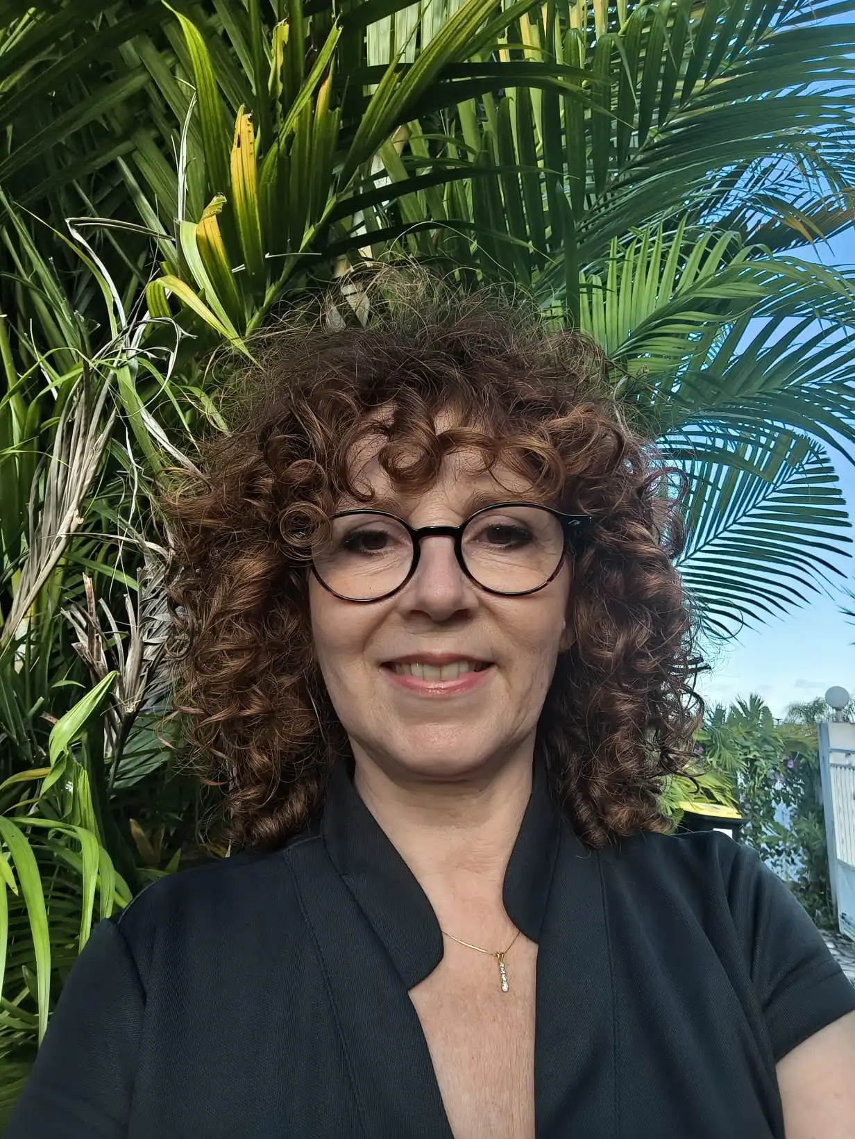 Ambiance zen de l'institut avec bougies et orchidées