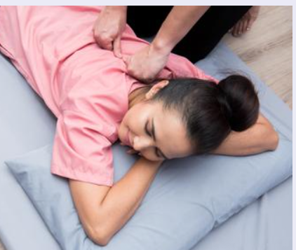 Tui Na du dos habillé